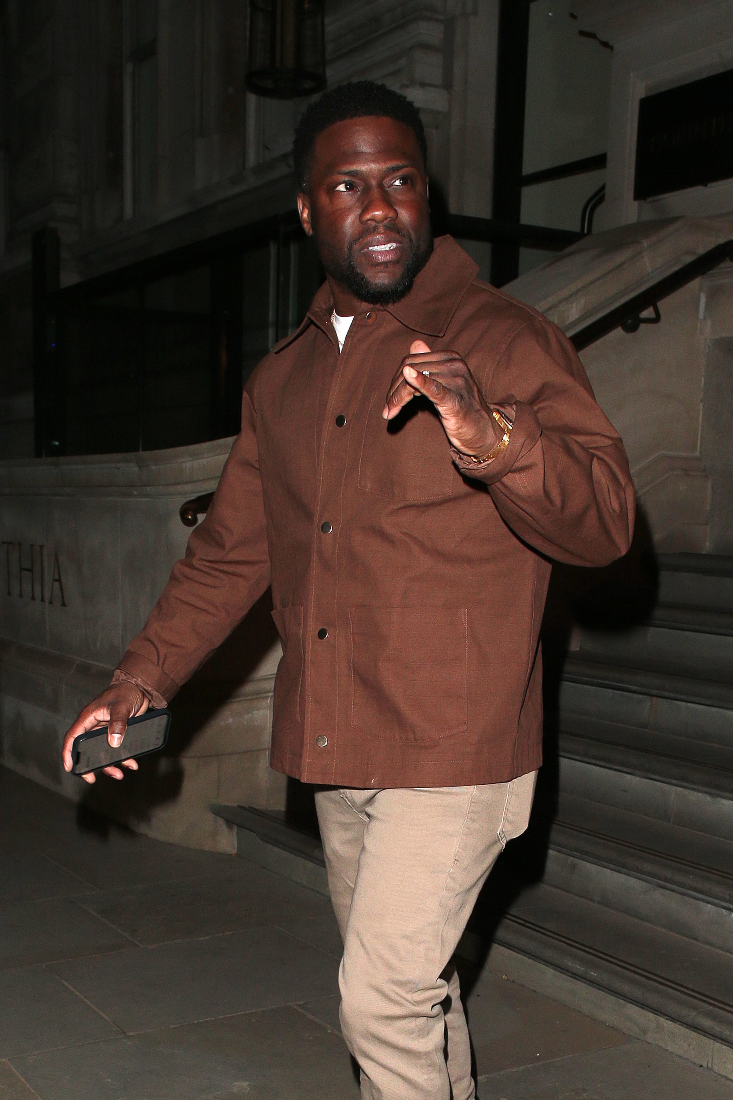 Kevin Hart in brown.